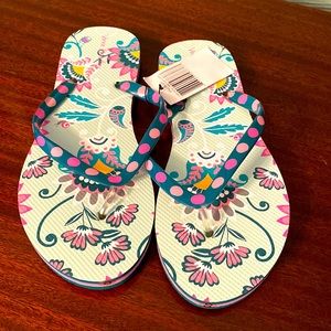 Women’s size small Vera Bradley flip flops. Never been worn!